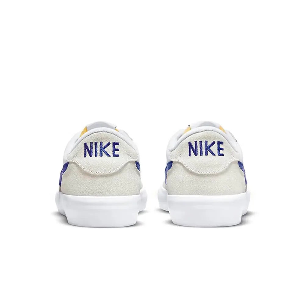 Nike Heritage Vulc SB Chaussures de skate basses confortables, antidérapantes, durables et légères Unisexe Blanc cassé et bleu CD5010-105