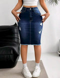 Jupe en jean extensible taille haute pour femme avec ourlet déchiré et effiloché, longueur genou, style une pièce