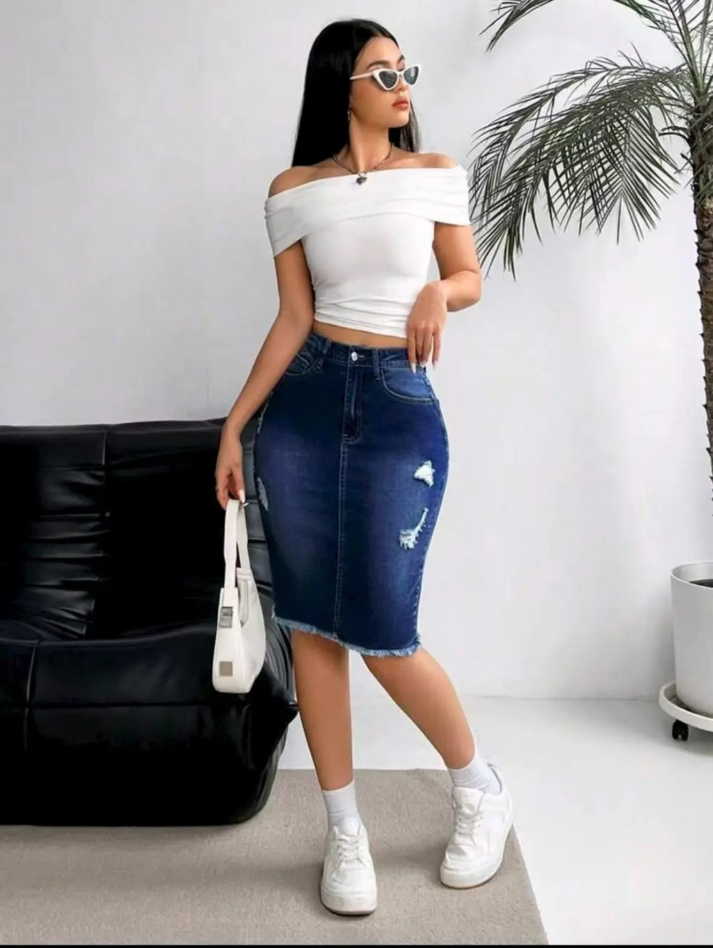 Jupe en jean extensible taille haute pour femme avec ourlet déchiré et effiloché, longueur genou, style une pièce
