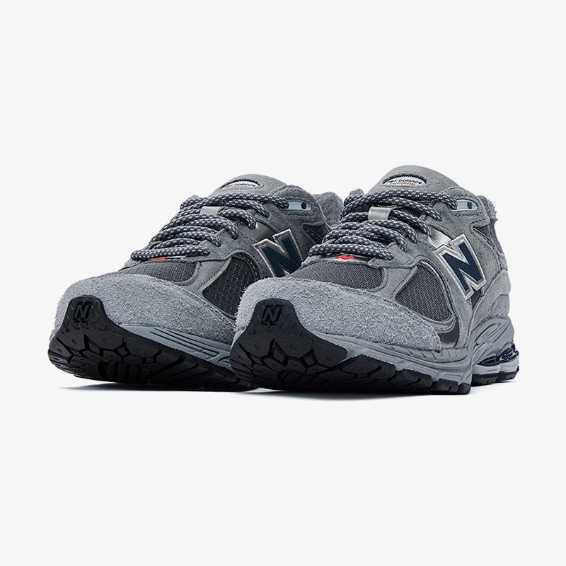 New Balance NB Genuine 2002R Series Baskets décontractées durables et antidérapantes pour hommes et femmes M2002RHG