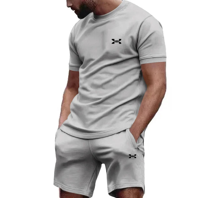 Nouveau été hommes décontracté shorts à manches courtes 2 pièces ville rue mode T-shirt shorts costume hommes cool course offre spéciale