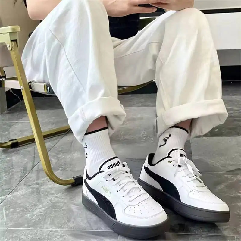 PUMA Baskets basses rétro avec logo pailleté blanc et noir, semelle en caoutchouc, chaussures de mode décontractées unisexes pour tous les jours 395082-09