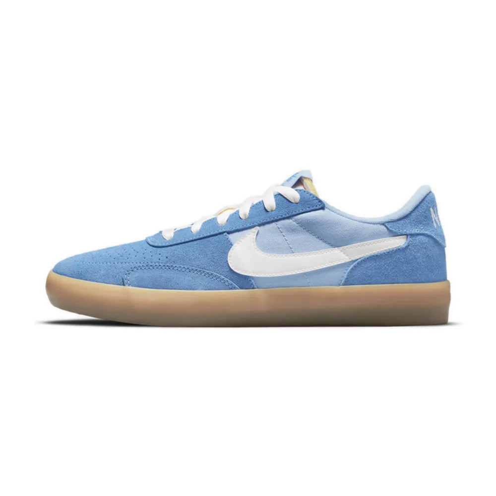 Nike Heritage Vulc SB Chaussures de skate basses confortables, antidérapantes, durables et légères Unisexe Blanc cassé et bleu CD5010-105