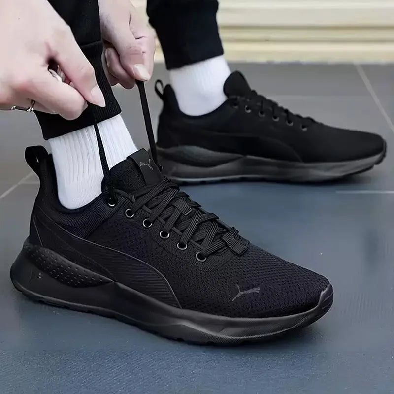 PUMA All Black Baskets de course décontractées légères et antidérapantes en maille respirante 371128-01