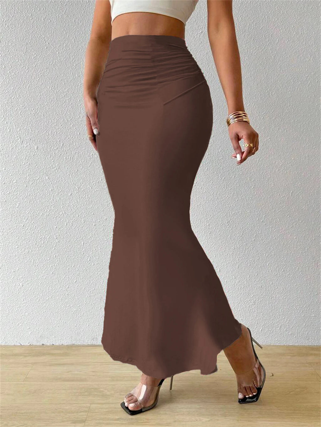 Femmes solide mince queue de poisson jupe printemps été nouveau en mode élégante taille haute plis jupes dame casual rue robe courte Sexy
