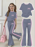 Tenue d'été décontractée pour filles : T-shirt à manches courtes imprimé nœud + pantalon long évasé, ensemble deux pièces avec bordure rose et imprimé nœud, tendance et polyvalent, adapté aux filles de 4 à 12 an