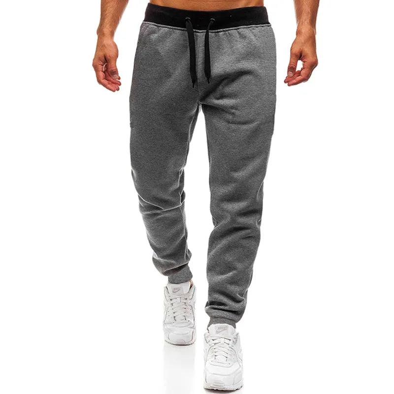 Hommes Joggers pantalons décontractés Fitness hommes vêtements de sport pantalons de survêtement pantalons de survêtement maigres pantalons noirs gymnases survêtement pantalons de survêtement