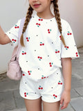 Ensemble imprimé motif cerise pour filles, haut blanc à manches courtes avec imprimé cerise + short, ensemble deux pièces, frais et tendance, adapté aux enfants de 4 à 12 ans, vêtements décontractés d'été pour la m