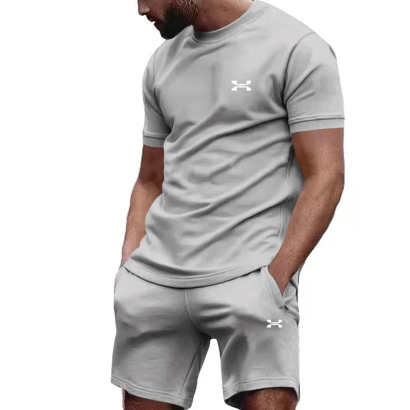 Nouveau été hommes décontracté shorts à manches courtes 2 pièces ville rue mode T-shirt shorts costume hommes cool course offre spéciale