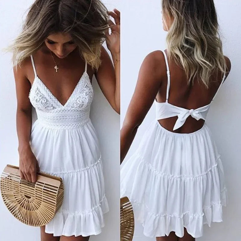 Robes en dentelle Sexy femmes Spaghetti sangle robe blanche été plage Mini robe de soirée a-ligne col en v Bohe dos ouvert robe plissée