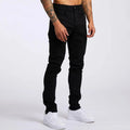 Jeans pour hommes élastique maigre couleur unie Stretch crayon pantalon coupe ajustée Denim jean Jogging Streetwear Cowboy pantalon décontracté noir